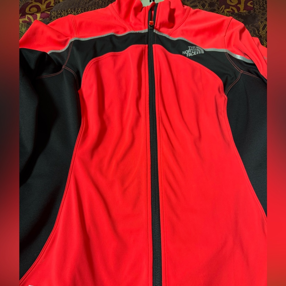 The North Face women's Vibrant Coral and Black Scuba Performance Jacket